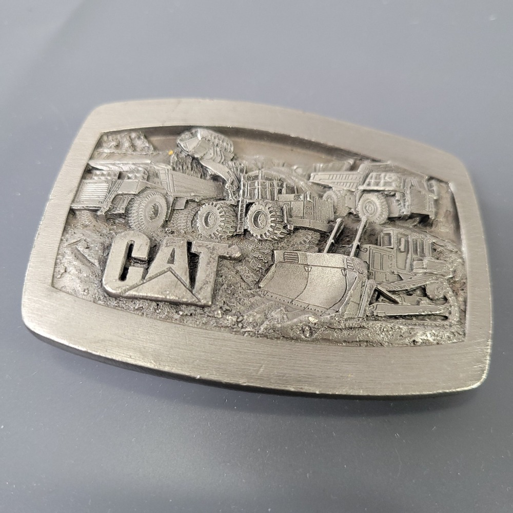 Vintage 1992 Caterpillar CAT Pit Crew Belt Buckle Norscot Group Construction USA